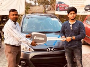 Adriz-Ghosh-Posing-with-His-Car