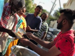 Chandan-Shetty-serving-the-poor