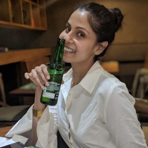 Chhavi-Mittal-driking-beer