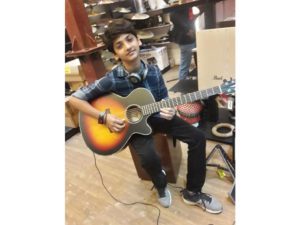 Varun-Roopani-playing-guitar